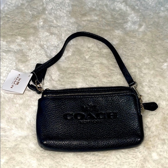 Coach Handbags - Coach Black Leather Clutch Wristlet